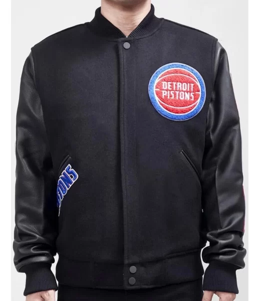 Detroit-Pistons-Black-And-White-Letterman-Varsity-Jacket-1.webp Detroit Pistons Black Letterman Varsity Jacket for authentic team pride and timeless varsity styling
